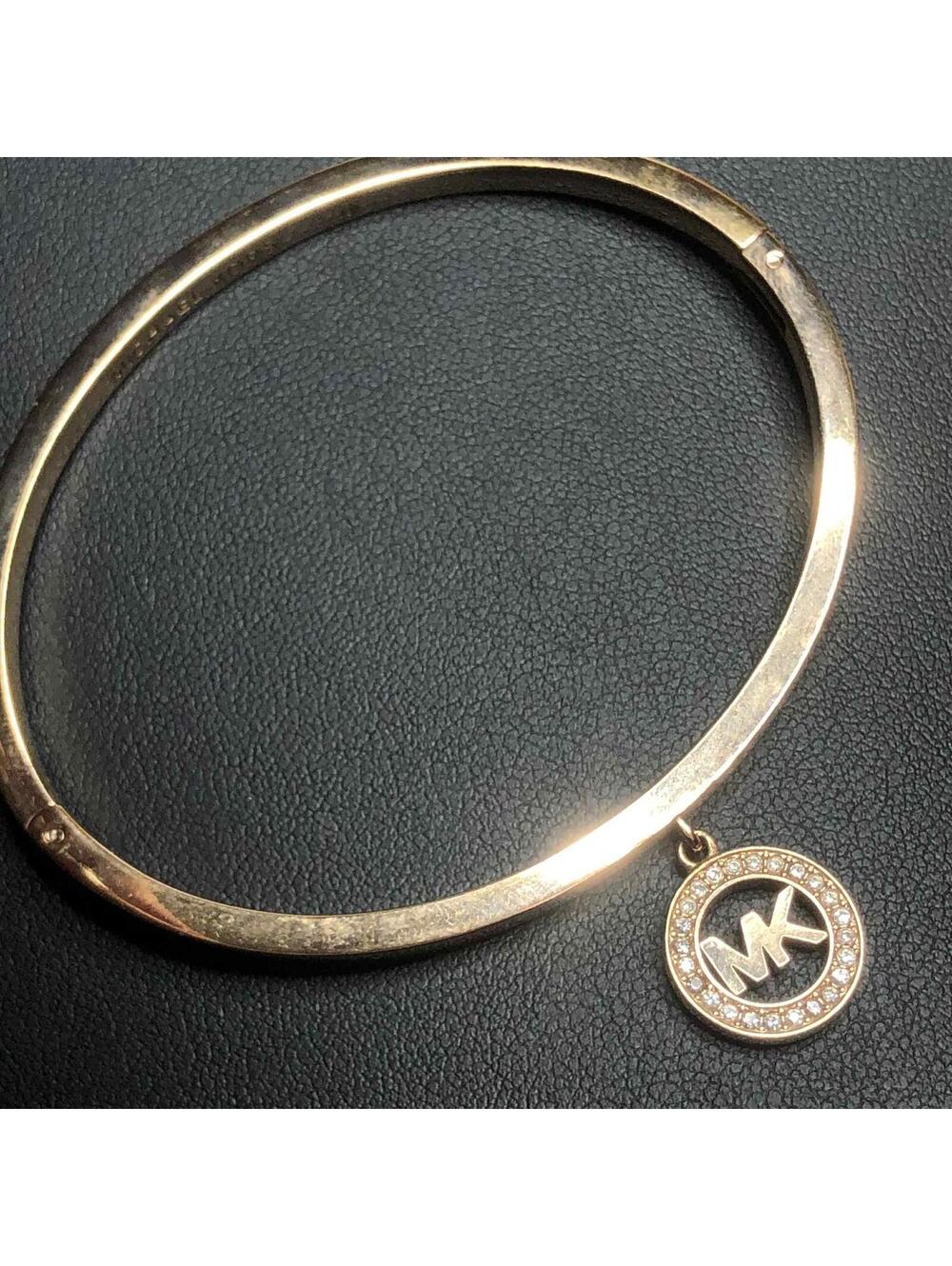 6997 Michael Kors gold tone MK logo CZ Charm Bracelet  7"